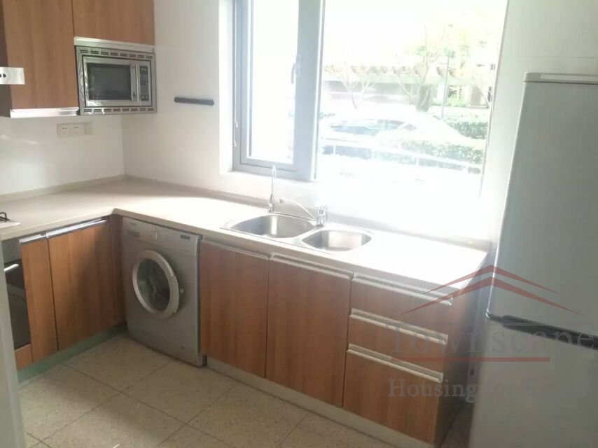 shanghai apartment with western kitchen 2BR ground floor apartment w/ balcony for rent in Gubei